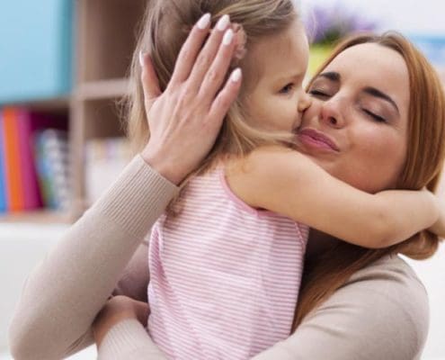 Children practicing grace and courtesy lessons, learning to interact respectfully in a Montessori environment.